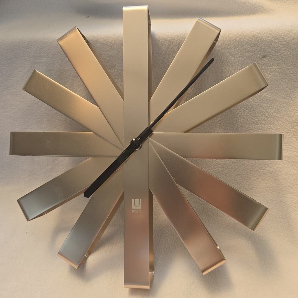 Stainless Steel Umbra Mid Century Modern Asterisk Wall Clock